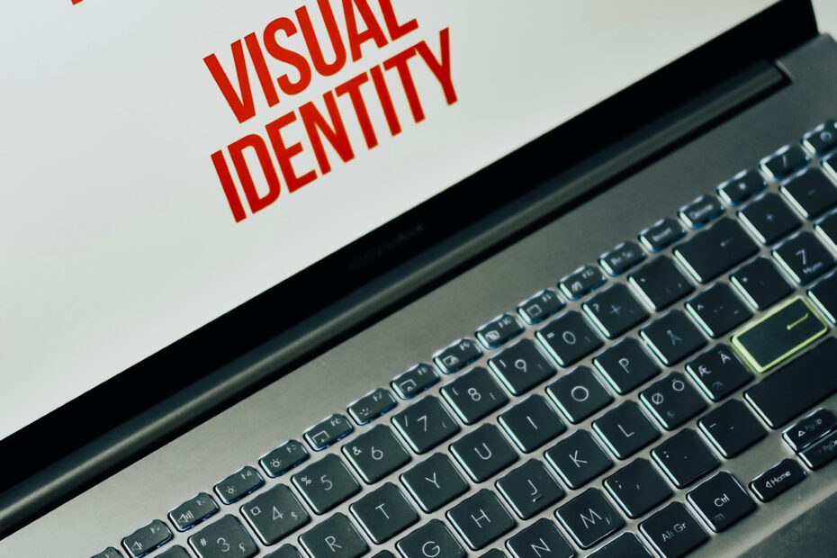 Laptop screen showing text on brand personality and visual identity for marketing strategy.